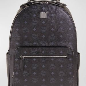 Lightly used  *authentic MCM mens black leather backpack*